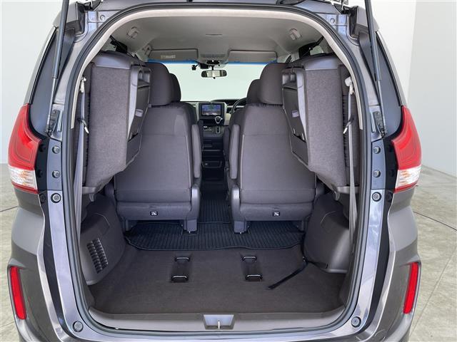 フリード Ｇ・ホンダセンシング　禁煙　８型ＳＤナビ　両側電動スライドドア　ＬＥＤライト　ビルトインＥＴＣ　純正フロアマット　レーダークルーズコントロール　レーンキープアシスト　リアサンシェード　電動格納サイドミラー　オートライト（30枚目）