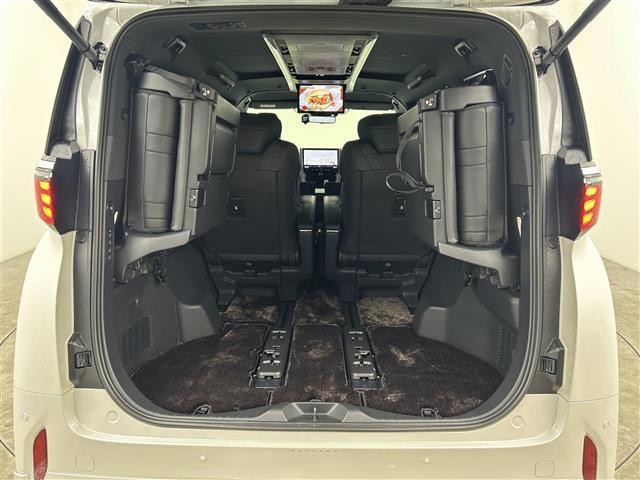 アルファードハイブリッド エグゼクティブラウンジ 禁煙車 純正14型ディスプレイオーディオナビ ワンオーナー トヨタセーフティセンス 左右独立ガラスルーフ JBLプレミアムサウンド 両側パワースライドドア 純正13型フリップダウンモニター(32枚目)