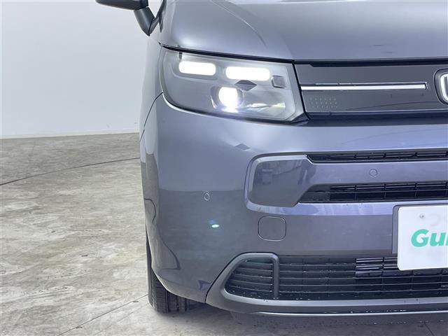 フリード ｅ：ＨＥＶエアー　ＥＸ　登録済未使用車　純正９型メモリナビ　ホンダセンシング　両側パワースライドドア　ブラインドスポットインフォメーション　パーキングセンサー　レーダークルーズコントロール　バックカメラ　ハーフレザーシート（40枚目）