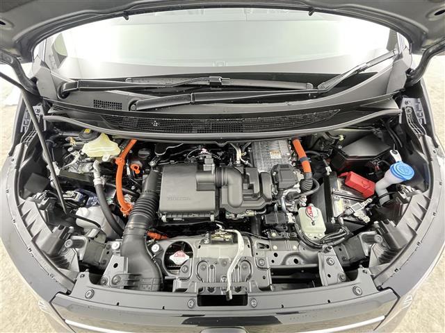 フリード ｅ：ＨＥＶエアー　ＥＸ　登録済未使用車　純正９型メモリナビ　ホンダセンシング　両側パワースライドドア　ブラインドスポットインフォメーション　パーキングセンサー　レーダークルーズコントロール　バックカメラ　ハーフレザーシート（42枚目）