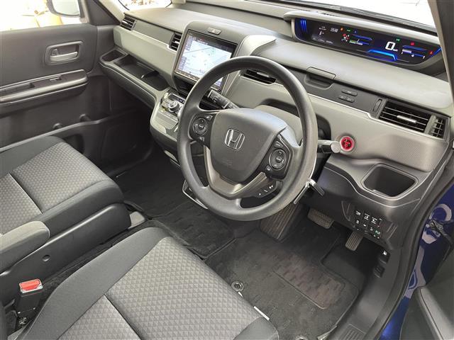 フリード＋ハイブリッド ハイブリッドＧ・ホンダセンシング　禁煙　純正９型ナビ　両側電動スライドドア　レーダークルーズコントロール　ＥＴＣ　バックカメラ　衝突軽減ブレーキ　レーンアシスト　純正フロアマット　ドアバイザー　後席サンシェード　電動格納サイドミラー（23枚目）