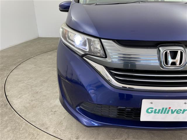 フリード＋ハイブリッド ハイブリッドＧ・ホンダセンシング　禁煙　純正９型ナビ　両側電動スライドドア　レーダークルーズコントロール　ＥＴＣ　バックカメラ　衝突軽減ブレーキ　レーンアシスト　純正フロアマット　ドアバイザー　後席サンシェード　電動格納サイドミラー（32枚目）