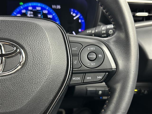 カローラツーリング ハイブリッド　ダブルバイビー　禁煙車　純正ディスプレイオーディオ　フルセグ　ＡｐｐｌｅＣａｒＰｒａｙ　ＡｎｄｒｏｉｄＡｕｔｏ　バックモニター　オートライト　オートハイビーム　レーダークルーズコントロール　ブラインドスポットモニター（7枚目）