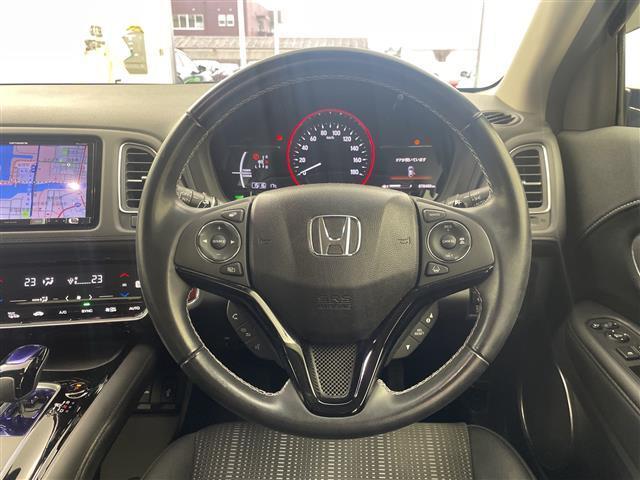 ヴェゼル ハイブリッドＺ・ホンダセンシング　禁煙車／社外ナビ／バックカメラ／レーダークルーズコントロール／シートヒーター／ハーフレザーシート／レーンキープアシスト／先行車発進おしらせ機能／パドルシフト／ビルトインＥＴＣ（13枚目）