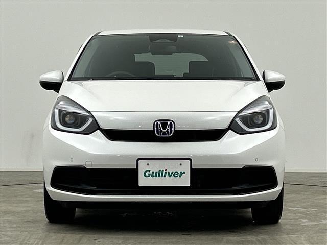 フィット ｅ：ＨＥＶベーシック　禁煙車／ホンダセンシング／純正ＳＤナビ／バックカメラ／レーダークルーズコントロール／レーンキープアシスト／ＥＴＣ／ＬＥＤオートライト／オートブレーキホールド／電子パーキング／前後コーナーセンサー（18枚目）