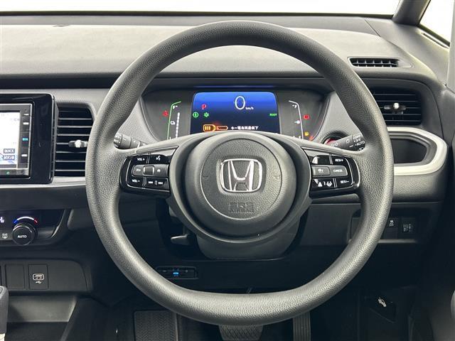 フィット ｅ：ＨＥＶベーシック　禁煙車／ホンダセンシング／純正ＳＤナビ／バックカメラ／レーダークルーズコントロール／レーンキープアシスト／ＥＴＣ／ＬＥＤオートライト／オートブレーキホールド／電子パーキング／前後コーナーセンサー（25枚目）