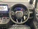 ｅ：ＨＥＶスパーダ　登録済み未使用車　純正１１．４型Ｈｏｎｄａ　ＣＯＮＮＥＣＴナビ　両側パワースライドドア　ホンダセンシング　衝突軽減ブレーキ　レーンキープアシスト　レーダークルーズコントロール　ブラインドスポットモニタ（21枚目）