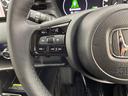 e:HEV Z 禁煙車/ホンダセンシング/純正9インチメモリナビ/フルセグTV/Bluetooth/カープレイ/バックカメラ/アダプティブクルーズコントロール/ハーフレザーシート/ハンズフリーアクセスパワーテールゲー(27枚目)
