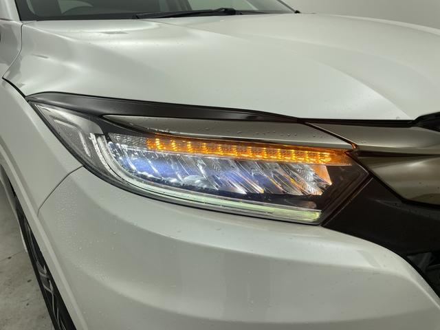 ヴェゼル ハイブリッドＺ・ホンダセンシング　純正８型ナビ　バックカメラ　アダプティブクルーズコントロール　レーンキープアシスト　衝突被害軽減ブレーキ　シートヒーター　ＬＥＤヘッドライト　ドライブレコーダー　ＥＴＣ　純正アルミホイール　禁煙車（51枚目）