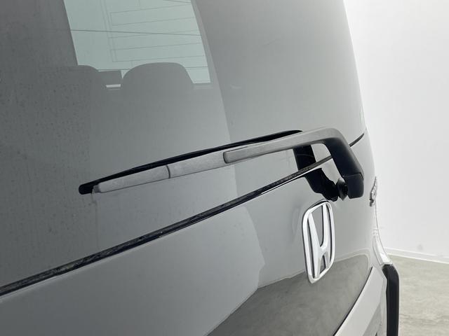 ステップワゴンスパーダ Ｚ　クールスピリット　純正９型ナビ　純正９型後席モニター　フルセグＴＶ　バックカメラ　両側電動スライドドア　クルーズコントロール　アイドリングストップ　パドルシフト　ＨＩＤ　前後ドラレコ　ＥＴＣ　スマートキー　禁煙車（76枚目）