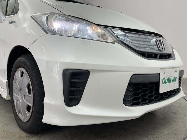 フリードハイブリッド ジャストセレクション 純正9型後席モニター 純正7型ナビ バックカメラ 両側電動スライドドア クルーズコントロール ハーフレザーシート ETC HIDヘッドライト オートライト 革巻きステアリング スマートキー 禁煙車(54枚目)