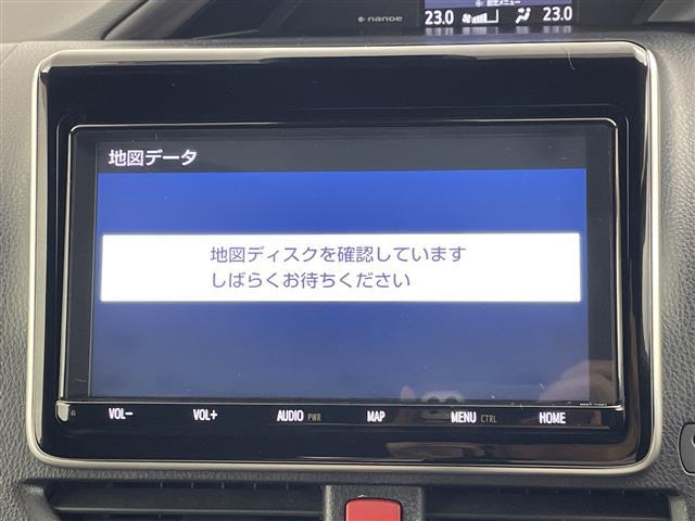 エスクァイア Gi プレミアムパッケージ ブラックテーラード 純正9型ナビ 純正12.1型後席モニター バックカメラ 衝突被害軽減ブレーキ 両側電動スライドドア 前後ドラレコ ビルトインETC ハーフレザーシート シートヒーター ハンドルヒーター LED 禁煙車(4枚目)