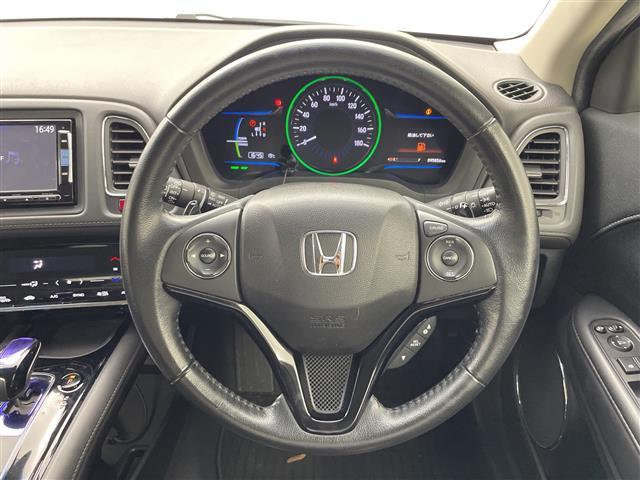 ヴェゼル ハイブリッドZ 純正7型ナビ ワンセグTV バックカメラ シートヒーター ハーフレザーシート クルーズコントロール パドルシフト ステアリングスイッチ プッシュスタート スタッドレスタイヤ4本積込 ETC 禁煙車(19枚目)