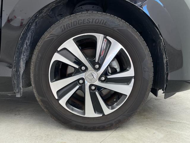 フリード G・ホンダセンシング 社外7型ナビ フルセグTV 衝突被害軽減システム 両側電動スライドドア ハーフレザーシート ステアリングスイッチ クルーズコントロール 横滑り防止機能 LEDライト ビルトインETC スマートキー(74枚目)