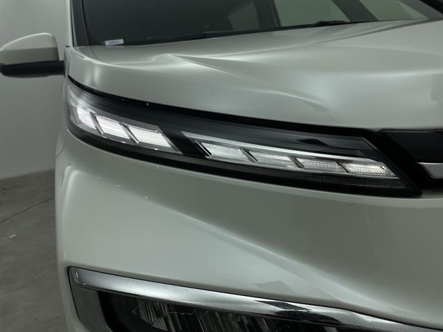 ヴォクシー ハイブリッドS-Z モデリスタエアロ 快適利便パッケージ ユニバーサルステップ 純正14型後席モニター 純正10.5型ナビ 電動リアゲート ステアリングヒーター 両側電動スライドドア ビルトインETC2.0 禁煙車(54枚目)