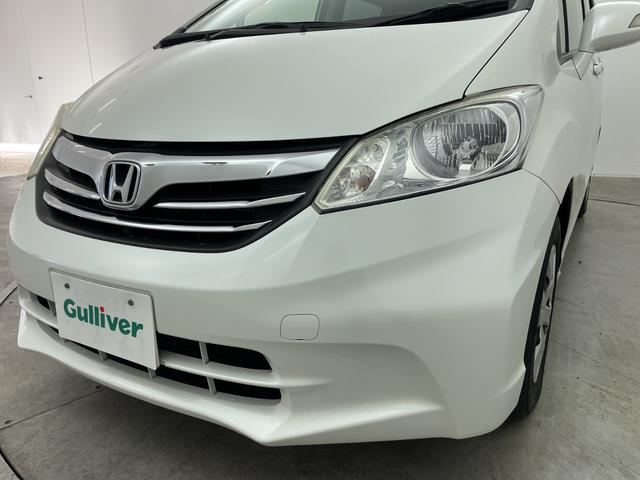 フリード G ジャストセレクション 社外7型ナビ フルセグTV バックカメラ 両側電動スライドドア 横滑り防止機能 ステアリングスイッチ オートエアコン HIDオートライト 純正フロアマット 前後ドライブレコーダー ビルトインETC(58枚目)