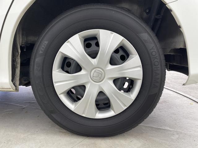 フリード G ジャストセレクション 社外7型ナビ フルセグTV バックカメラ 両側電動スライドドア 横滑り防止機能 ステアリングスイッチ オートエアコン HIDオートライト 純正フロアマット 前後ドライブレコーダー ビルトインETC(65枚目)