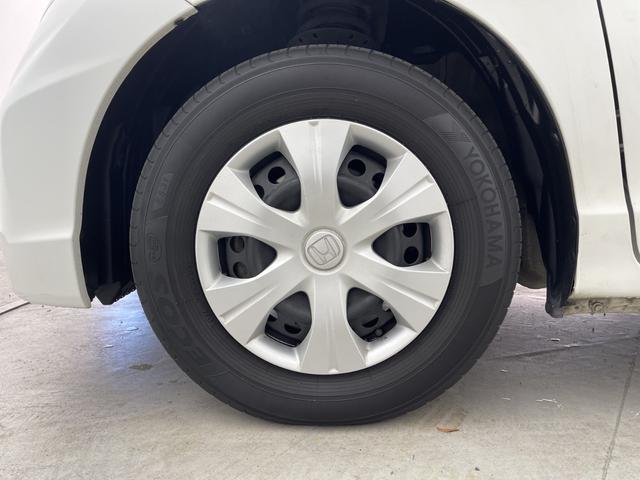 フリード G ジャストセレクション 社外7型ナビ フルセグTV バックカメラ 両側電動スライドドア 横滑り防止機能 ステアリングスイッチ オートエアコン HIDオートライト 純正フロアマット 前後ドライブレコーダー ビルトインETC(67枚目)