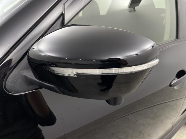 ジューク 15RX Vセレクション 純正7型ナビ フルセグTV 全周囲カメラ 衝突被害軽減システム アイドリングストップ機能 プッシュスタート ステアリングスイッチ 横滑り防止機能 オートエアコン キセノンオートライト ETC(61枚目)