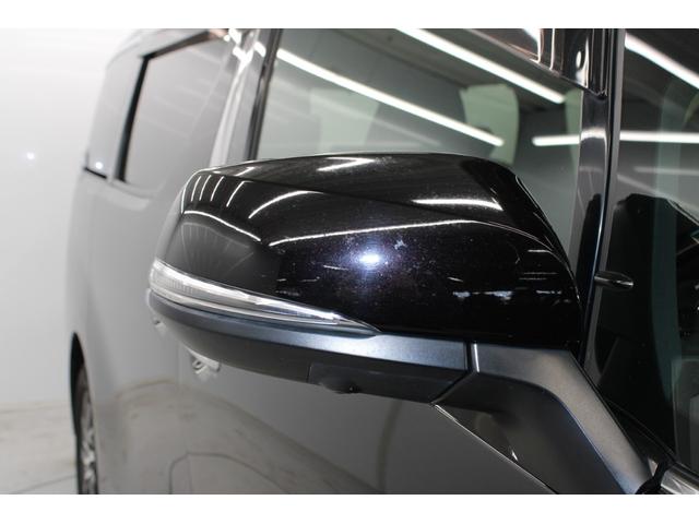 ヴェルファイアハイブリッド エグゼクティブラウンジ　禁煙車　純正１０インチナビ　ＪＢＬサウンド　全周囲カメラ　革シート　両側電動ドア　レーダークルーズ　シートヒーター　後席モニター　応急用スペアタイヤ　オットマン　電動リアゲート　パワーシート（11枚目）