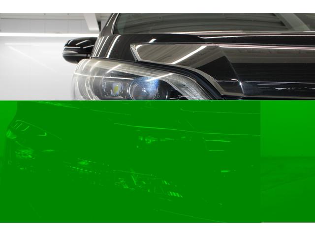 ヴェルファイアハイブリッド エグゼクティブラウンジ　禁煙車　純正１０インチナビ　ＪＢＬサウンド　全周囲カメラ　革シート　両側電動ドア　レーダークルーズ　シートヒーター　後席モニター　応急用スペアタイヤ　オットマン　電動リアゲート　パワーシート（13枚目）