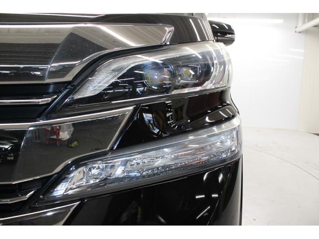 ヴェルファイアハイブリッド エグゼクティブラウンジ　禁煙車　純正１０インチナビ　ＪＢＬサウンド　全周囲カメラ　革シート　両側電動ドア　レーダークルーズ　シートヒーター　後席モニター　応急用スペアタイヤ　オットマン　電動リアゲート　パワーシート（16枚目）