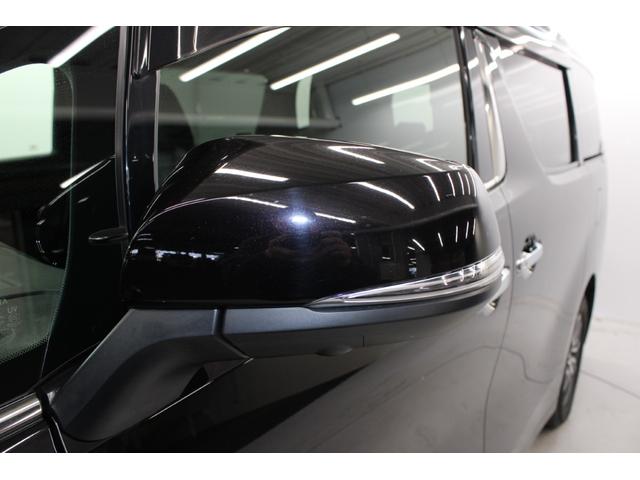 ヴェルファイアハイブリッド エグゼクティブラウンジ　禁煙車　純正１０インチナビ　ＪＢＬサウンド　全周囲カメラ　革シート　両側電動ドア　レーダークルーズ　シートヒーター　後席モニター　応急用スペアタイヤ　オットマン　電動リアゲート　パワーシート（18枚目）