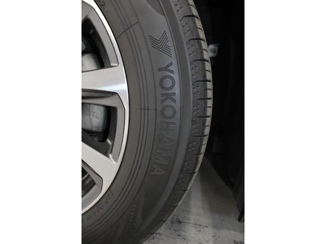 ヴェルファイアハイブリッド エグゼクティブラウンジ　禁煙車　純正１０インチナビ　ＪＢＬサウンド　全周囲カメラ　革シート　両側電動ドア　レーダークルーズ　シートヒーター　後席モニター　応急用スペアタイヤ　オットマン　電動リアゲート　パワーシート（21枚目）