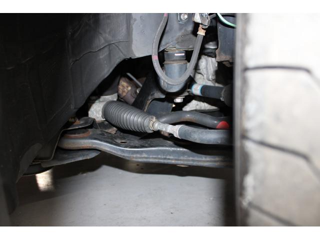 ヴェルファイアハイブリッド エグゼクティブラウンジ　禁煙車　純正１０インチナビ　ＪＢＬサウンド　全周囲カメラ　革シート　両側電動ドア　レーダークルーズ　シートヒーター　後席モニター　応急用スペアタイヤ　オットマン　電動リアゲート　パワーシート（27枚目）