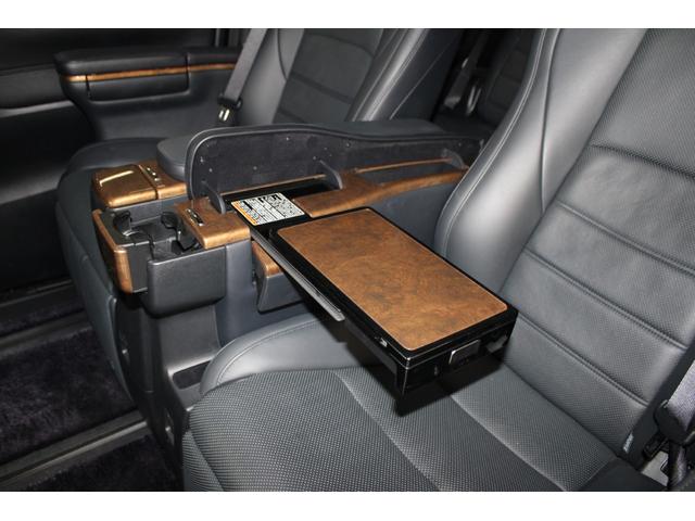 ヴェルファイアハイブリッド エグゼクティブラウンジ　禁煙車　純正１０インチナビ　ＪＢＬサウンド　全周囲カメラ　革シート　両側電動ドア　レーダークルーズ　シートヒーター　後席モニター　応急用スペアタイヤ　オットマン　電動リアゲート　パワーシート（54枚目）