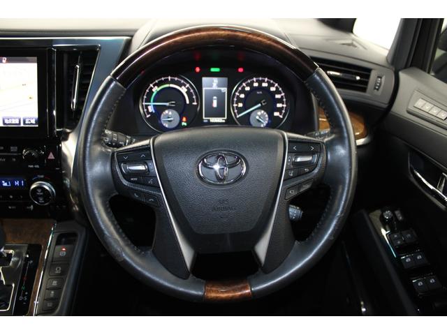 ヴェルファイアハイブリッド エグゼクティブラウンジ　禁煙車　純正１０インチナビ　ＪＢＬサウンド　全周囲カメラ　革シート　両側電動ドア　レーダークルーズ　シートヒーター　後席モニター　応急用スペアタイヤ　オットマン　電動リアゲート　パワーシート（55枚目）