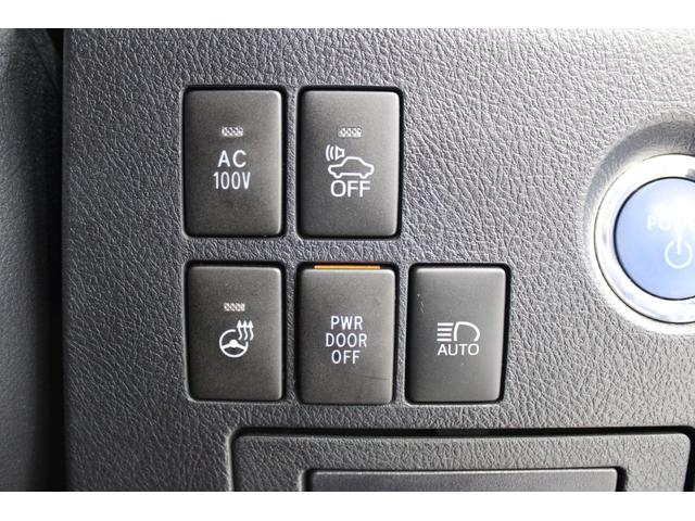 ヴェルファイアハイブリッド エグゼクティブラウンジ　禁煙車　純正１０インチナビ　ＪＢＬサウンド　全周囲カメラ　革シート　両側電動ドア　レーダークルーズ　シートヒーター　後席モニター　応急用スペアタイヤ　オットマン　電動リアゲート　パワーシート（63枚目）