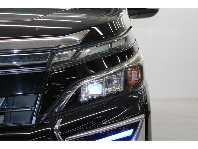 ヴォクシー ZS 後期型 禁煙車 サンルーフ ALPINE12.8型後席モニター モデリスタフルエアロ 純正10インチナビ バックカメラ フルセグ 両側電動スライドドア 衝突軽減 クルーズコントロール ビルトインETC(16枚目)