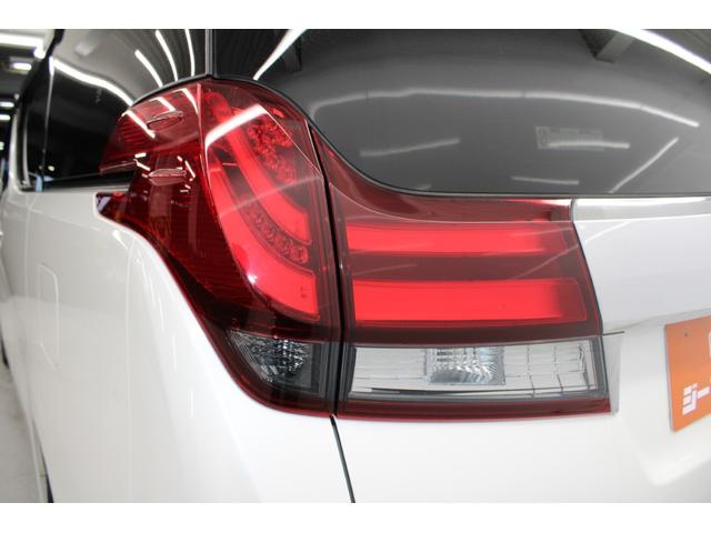 アルファード 2.5G 禁煙車 サンルーフ 純正12.1型後席モニター 純正10型ナビ バックカメラ フルセグ クリアランスソナー 両側電動スライドドア ベージュ内装 パワーシート オットマン ETC 純正17インチAW(22枚目)
