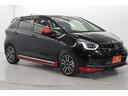 フィット ｅ：ＨＥＶリュクス　後期型　禁煙車　モデューロエアロ　純正９インチナビ　ワイアレス充電　ホンダセンシング　レーダークルーズコントロール　ステヤリングヒーター　シートヒーター　フルセグ　クリアランスソナー　ＬＥＤ（4枚目）