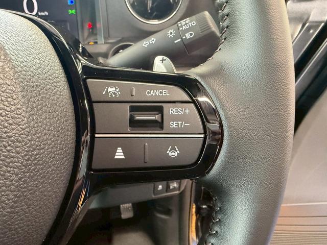 Ｎ－ＢＯＸカスタム ターボ４ＷＤ　■届出済未使用【純正８型ナビ・両電動スライド・　衝突軽減・追従クルコン・ヒーター付きハーフレザーシート】車線逸脱警報／Ｂカメラ／フルセグＴＶ／ＢＴ／純正１５ＡＷ／ＬＥＤオートライト／ソナー／フォグ／ブレーキホールド／ヘッドライトレベライザー／保証書（21枚目）