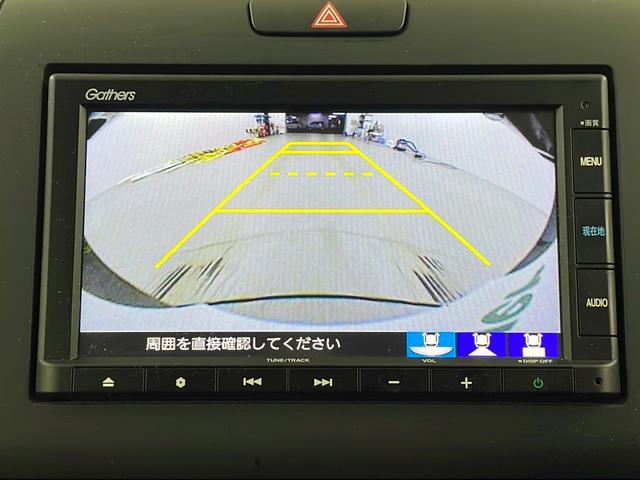 フリードハイブリッド ハイブリッド・Ｇホンダセンシング　純正ナビ　バックカメラ　両側パワースライドドア　ビルトインＥＴＣ　アダプティブクルーズコントロール　前席シートヒーター　レーンキープアシスト　純正アルミホイール　ＬＥＤヘッドライト　純正フロアマット（3枚目）