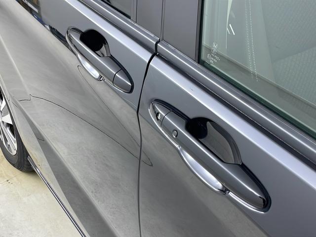 フリードハイブリッド ハイブリッド・Ｇホンダセンシング　純正ナビ　バックカメラ　両側パワースライドドア　ビルトインＥＴＣ　アダプティブクルーズコントロール　前席シートヒーター　レーンキープアシスト　純正アルミホイール　ＬＥＤヘッドライト　純正フロアマット（54枚目）