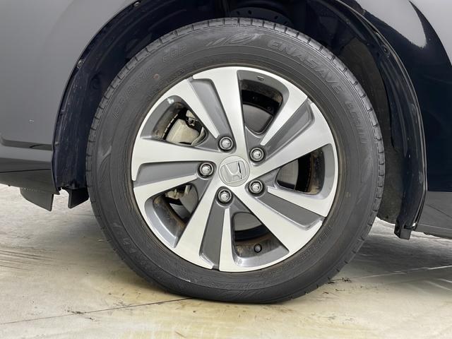 フリードハイブリッド ハイブリッド・Ｇホンダセンシング　純正ナビ　バックカメラ　両側パワースライドドア　ビルトインＥＴＣ　アダプティブクルーズコントロール　前席シートヒーター　レーンキープアシスト　純正アルミホイール　ＬＥＤヘッドライト　純正フロアマット（74枚目）