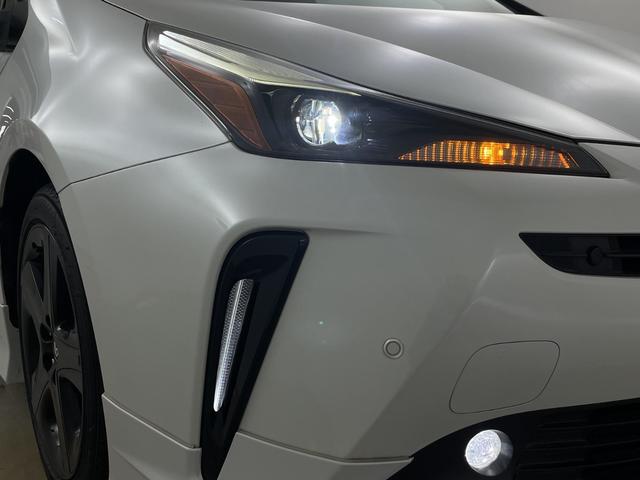 プリウス Sツーリングセレクション・ブラックエディション モデューロエアロ 純正ナビ 地デジフルセグ 全方位カメラ ETC2.0 アダプティブクルーズコントロール 車線逸脱警報 オートマチックハイビーム 衝突軽減ブレーキ AC100V 前席シートヒーター(51枚目)