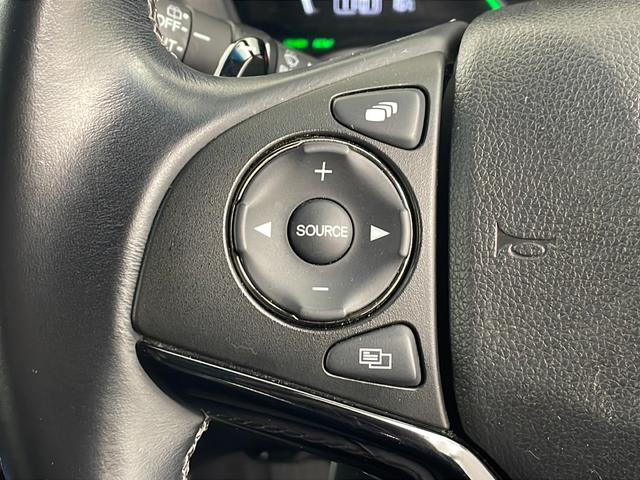 ヴェゼル ハイブリッドRS・ホンダセンシング 純正ナビ バックカメラ フルセグテレビ ビルトインETC レーダークルーズコントロール 衝突被害軽減ブレーキ シートヒーター パドルシフト 自動防眩式ルームミラー ハーフレザーシート プッシュスタート(10枚目)