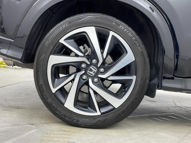 ヴェゼル ハイブリッドRS・ホンダセンシング 純正ナビ バックカメラ フルセグテレビ ビルトインETC レーダークルーズコントロール 衝突被害軽減ブレーキ シートヒーター パドルシフト 自動防眩式ルームミラー ハーフレザーシート プッシュスタート(73枚目)