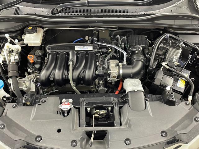 ヴェゼル ハイブリッドRS・ホンダセンシング 純正ナビ バックカメラ フルセグテレビ ビルトインETC レーダークルーズコントロール 衝突被害軽減ブレーキ シートヒーター パドルシフト 自動防眩式ルームミラー ハーフレザーシート プッシュスタート(78枚目)