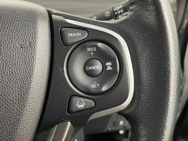 フリードハイブリッド ハイブリッド・Gホンダセンシング 社外ナビ バックカメラ 前方ドライブレコーダー ビルトインETC アダプティブクルーズコントロール 衝突軽減ブレーキ 車線逸脱警報 先行車発進 標識認識 社外フロアマット 純正18インチアルミホイール(12枚目)