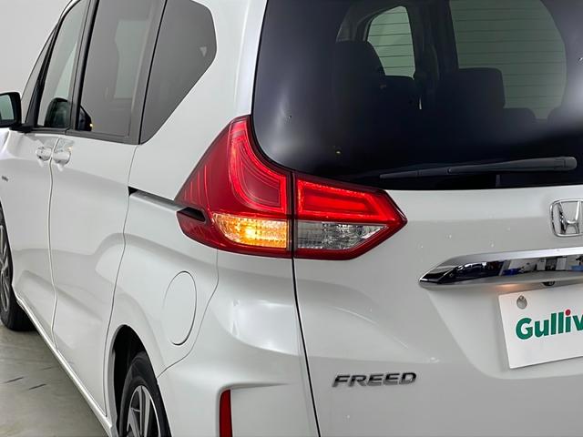 フリードハイブリッド ハイブリッド・Gホンダセンシング 社外ナビ バックカメラ 前方ドライブレコーダー ビルトインETC アダプティブクルーズコントロール 衝突軽減ブレーキ 車線逸脱警報 先行車発進 標識認識 社外フロアマット 純正18インチアルミホイール(50枚目)