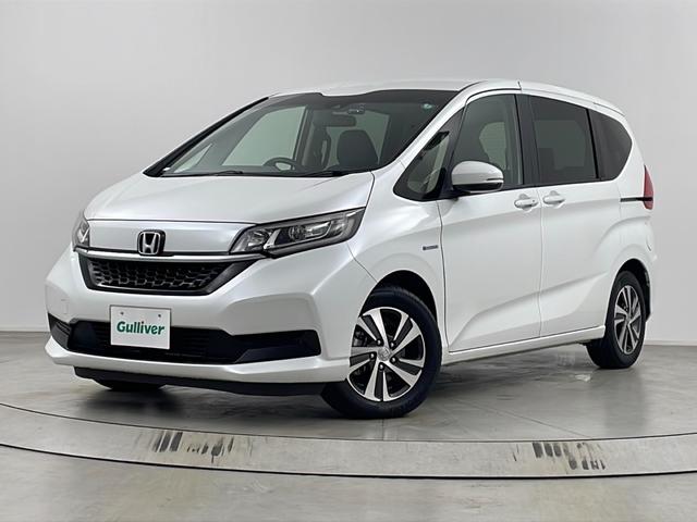 フリードハイブリッド ハイブリッド・Gホンダセンシング 社外ナビ バックカメラ 前方ドライブレコーダー ビルトインETC アダプティブクルーズコントロール 衝突軽減ブレーキ 車線逸脱警報 先行車発進 標識認識 社外フロアマット 純正18インチアルミホイール(65枚目)