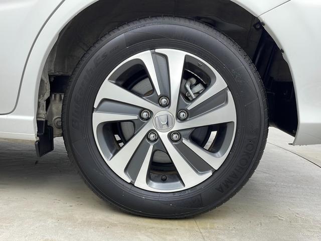 フリードハイブリッド ハイブリッド・Gホンダセンシング 社外ナビ バックカメラ 前方ドライブレコーダー ビルトインETC アダプティブクルーズコントロール 衝突軽減ブレーキ 車線逸脱警報 先行車発進 標識認識 社外フロアマット 純正18インチアルミホイール(68枚目)