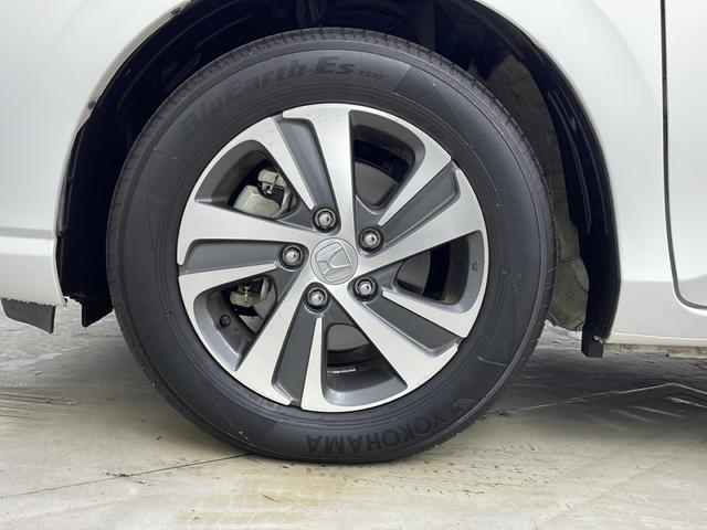 フリードハイブリッド ハイブリッド・Gホンダセンシング 社外ナビ バックカメラ 前方ドライブレコーダー ビルトインETC アダプティブクルーズコントロール 衝突軽減ブレーキ 車線逸脱警報 先行車発進 標識認識 社外フロアマット 純正18インチアルミホイール(69枚目)