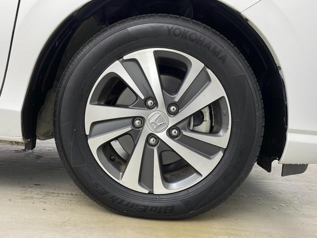 フリードハイブリッド ハイブリッド・Gホンダセンシング 社外ナビ バックカメラ 前方ドライブレコーダー ビルトインETC アダプティブクルーズコントロール 衝突軽減ブレーキ 車線逸脱警報 先行車発進 標識認識 社外フロアマット 純正18インチアルミホイール(71枚目)