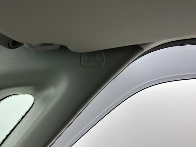 ステップワゴン e:HEVエアー EX フリップダウンモニター 純正ナビ 全方位カメラ BSM ビルトインETC 前席シートヒーター パワーバックドア レーダークルーズコントロール 衝突軽減システム 両側パワースライドドア オットマン(38枚目)